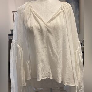 Elegant White Women's Oversized Peasant Crinkle hi-low Top with ballon sleeves .